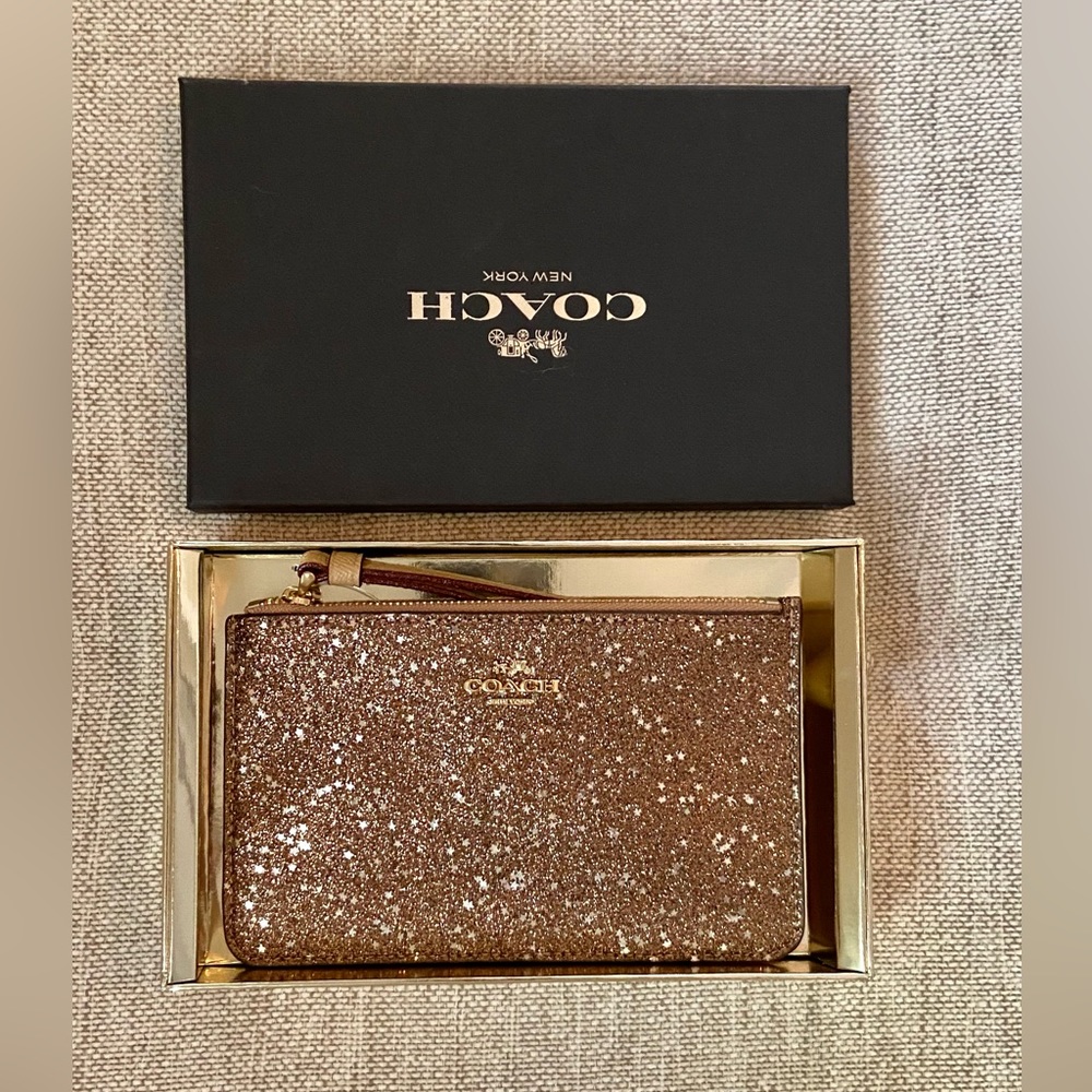 Coach starts glitter wristlet